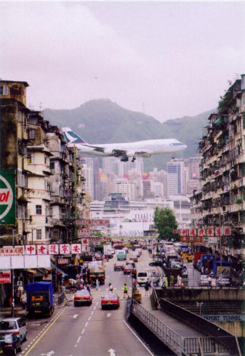 Cathay Pacific approaching Kai Tak Airport. Cathay Pacific approaching Kai Tak Airport.